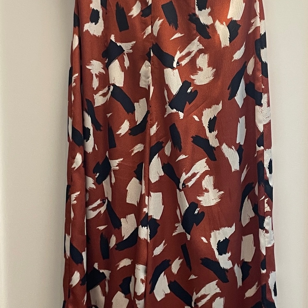 Lush Abstract Jumpsuit in Rust, Black, and White